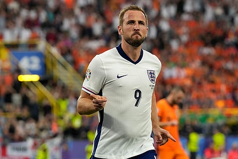 Harry Kane celebrates after scoring a goal